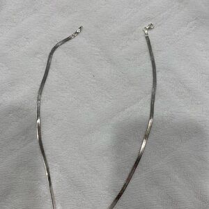 Silver Necklace with hearth pendant.